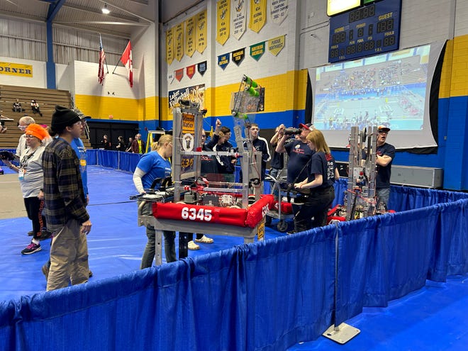 High school teams make their final preparations at the LSSU FIRST robotics competition on March 24, 2023.