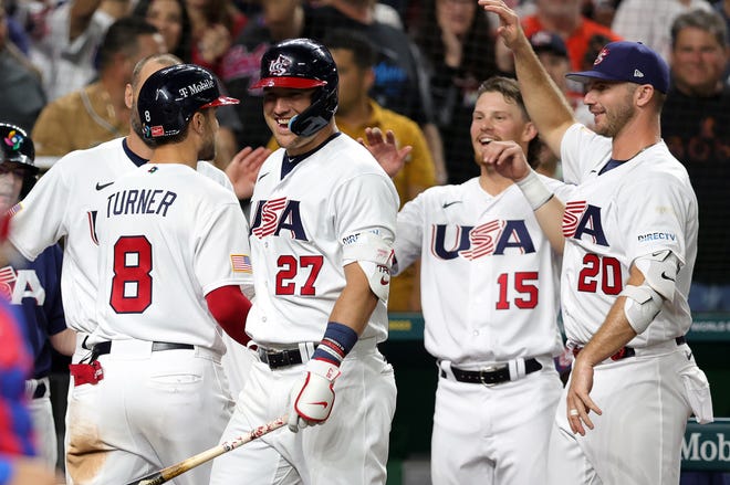 Trea Turner (8) with teammates after hitting a three-run home run in the sixth inning against Team Cuba.