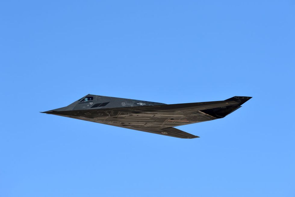 f 117 nighthawk stealth fighter flies in death valley, california
