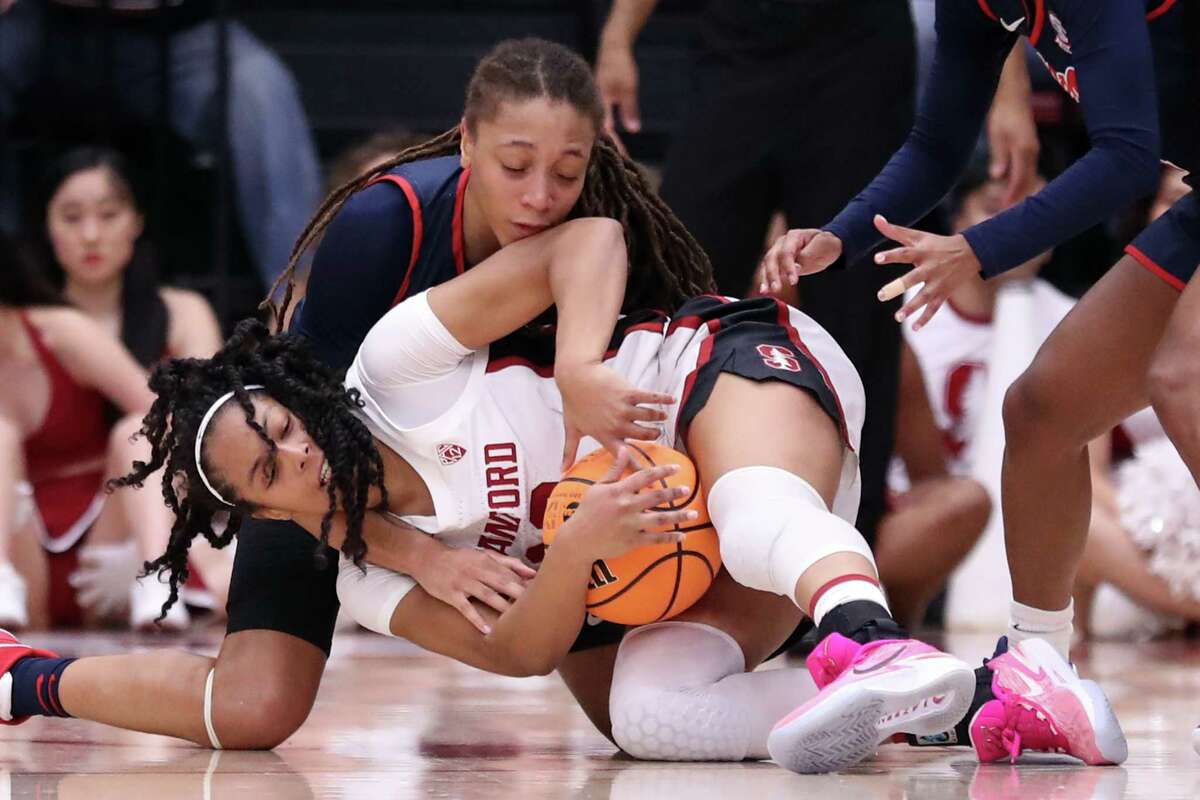 Stanford’s Indya Nivar and Mississippi’s Madison Scott battle fora loose ball in 3rd quarter during Ole Miss’ 54-49 win in NCAA Division I Women's Basketball Tournament at Maples Pavilion in Stanford, Calif., on Sunday, March 19, 2023.