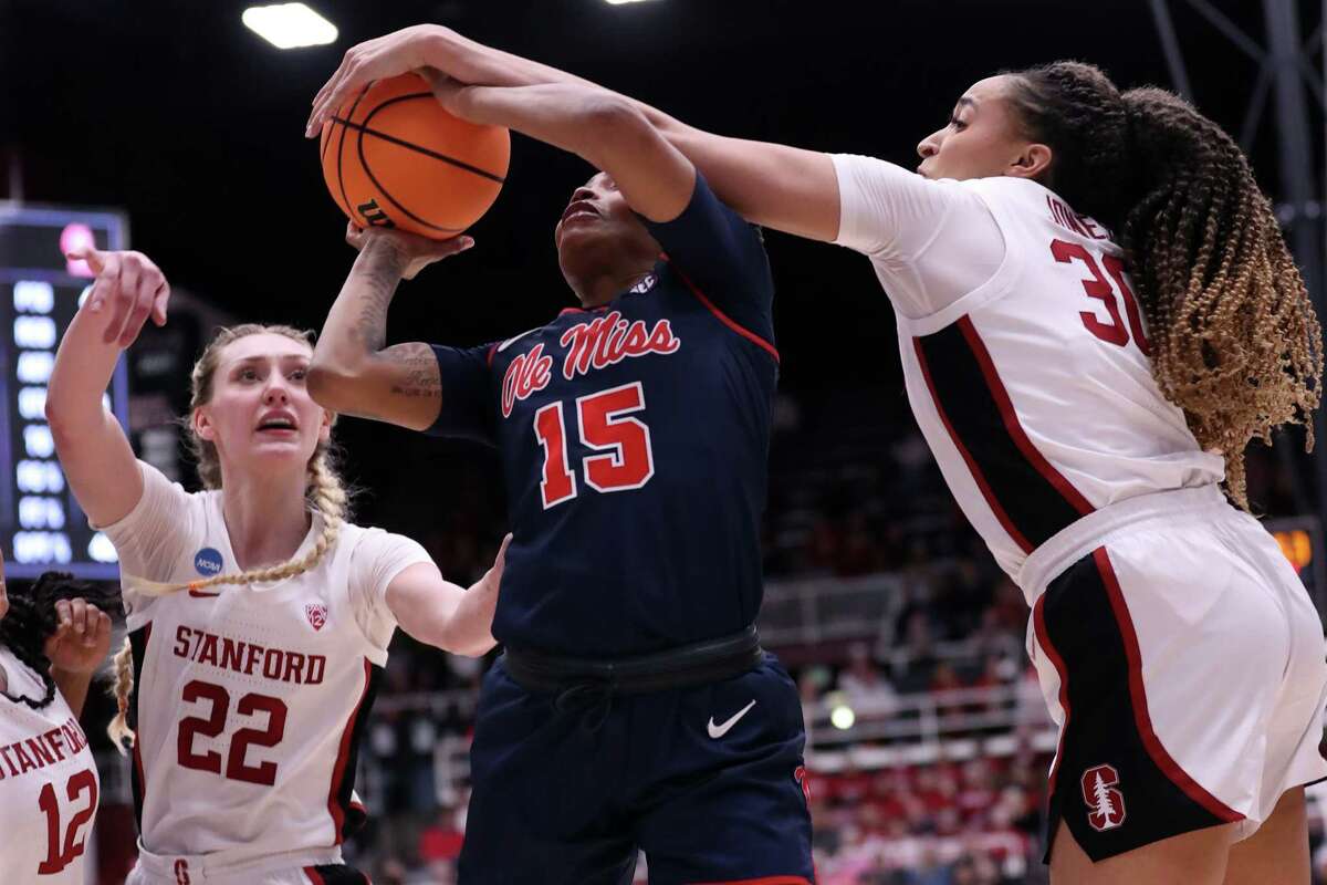 Stanford’s Haley Jones fouls Mississippi’s Angel Baker as Cameron Brink watches during Ole Miss’ 54-49 win in NCAA Division I Women's Basketball Tournament at Maples Pavilion in Stanford, Calif., on Sunday, March 19, 2023.